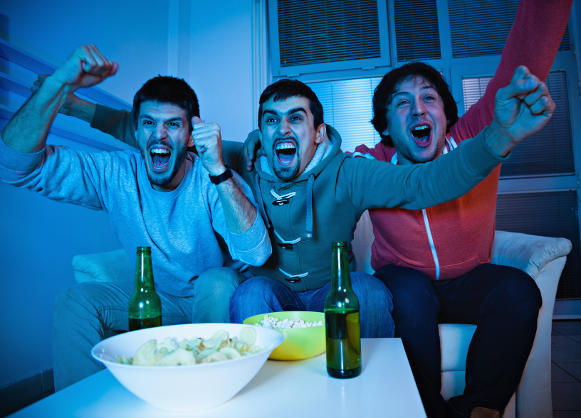 Friends watching sports on TV